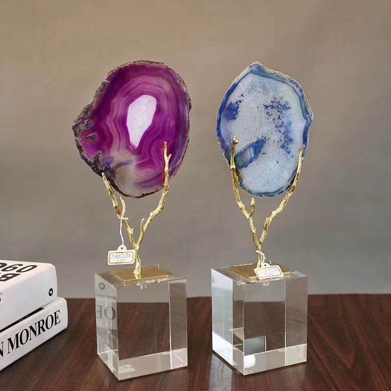Natural agate slice decorative stand showcasing unique stone patterns for luxury home décor.