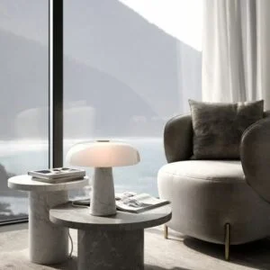 Luxury marble side table set with modern round coffee tables in a contemporary living room