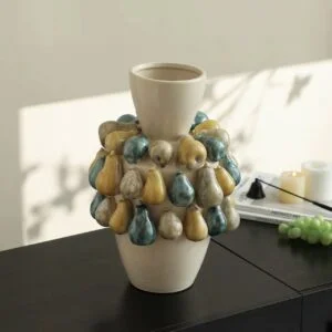 Salina Accent Vase featuring decorative pear-inspired ceramic accents and a glazed finish for modern home décor.