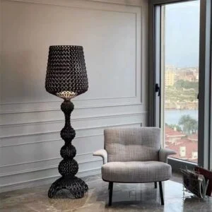 Luxury handwoven floor lamp with sculptural base in a contemporary living room